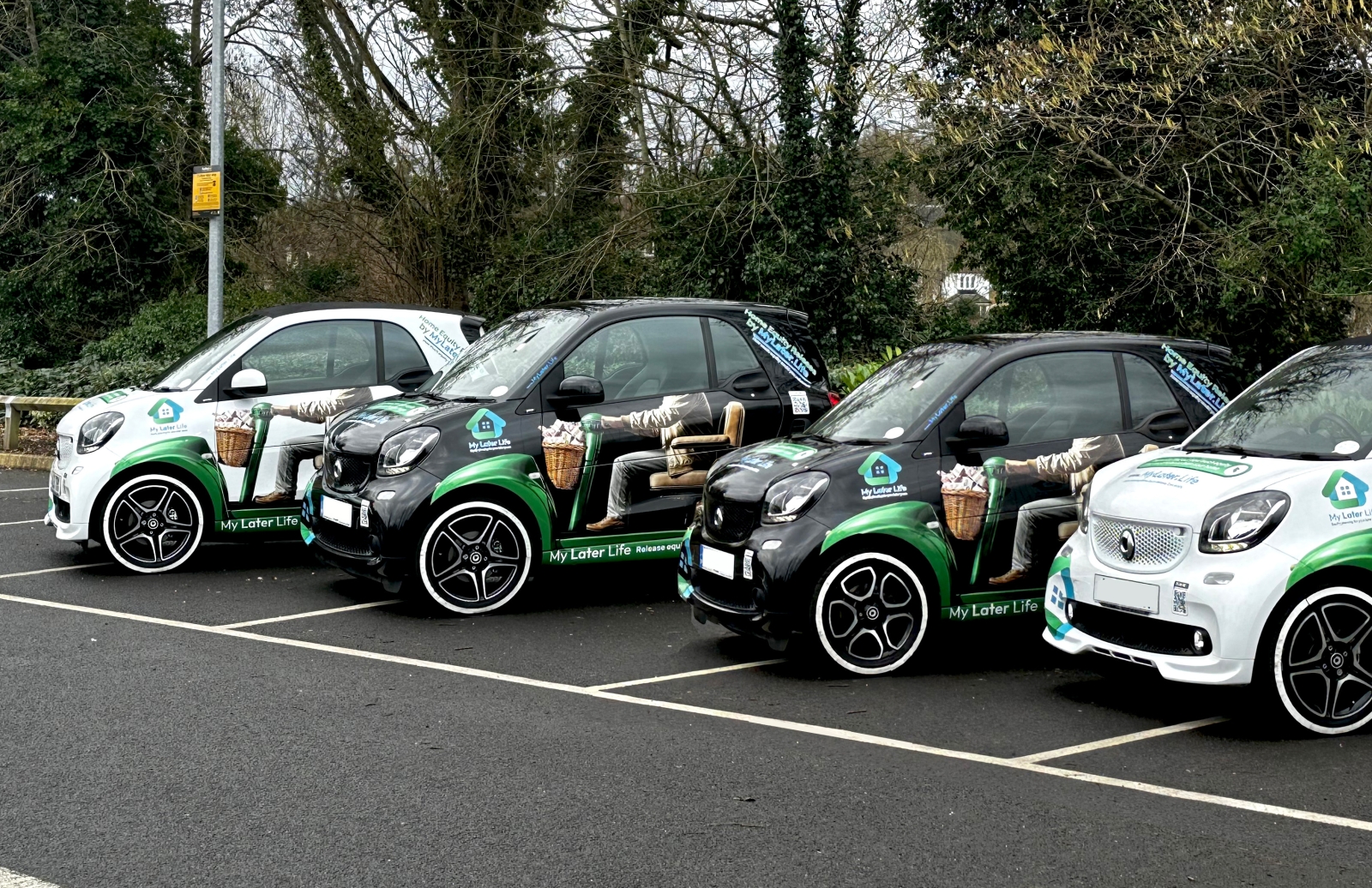 out fleet of custom branded smart cars 